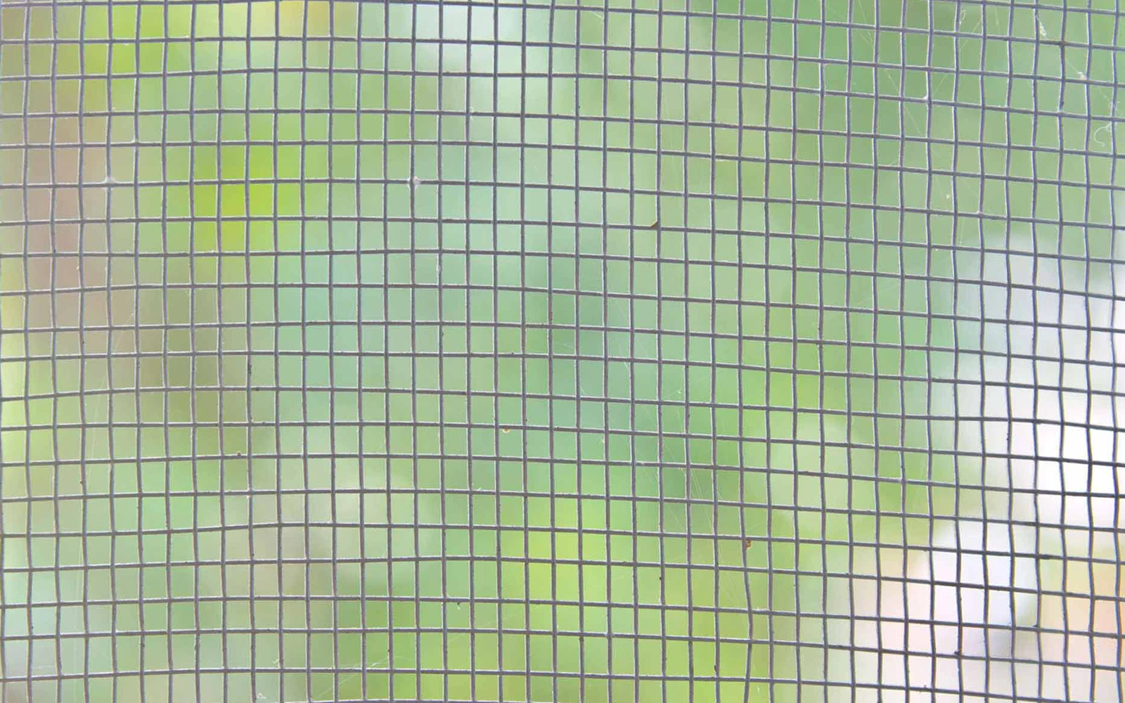 A close-up of a garage door screen
